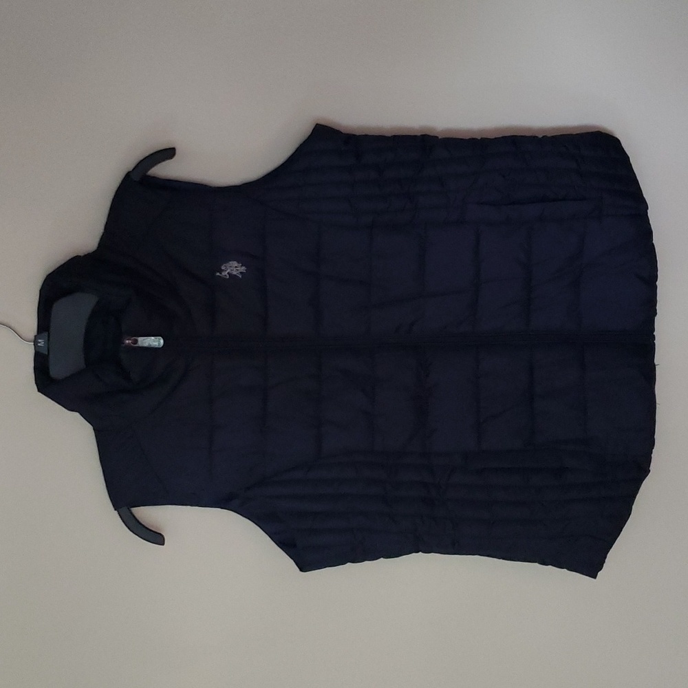 U.S. Polo Assn puffer vest in navy blue, women's size medium.